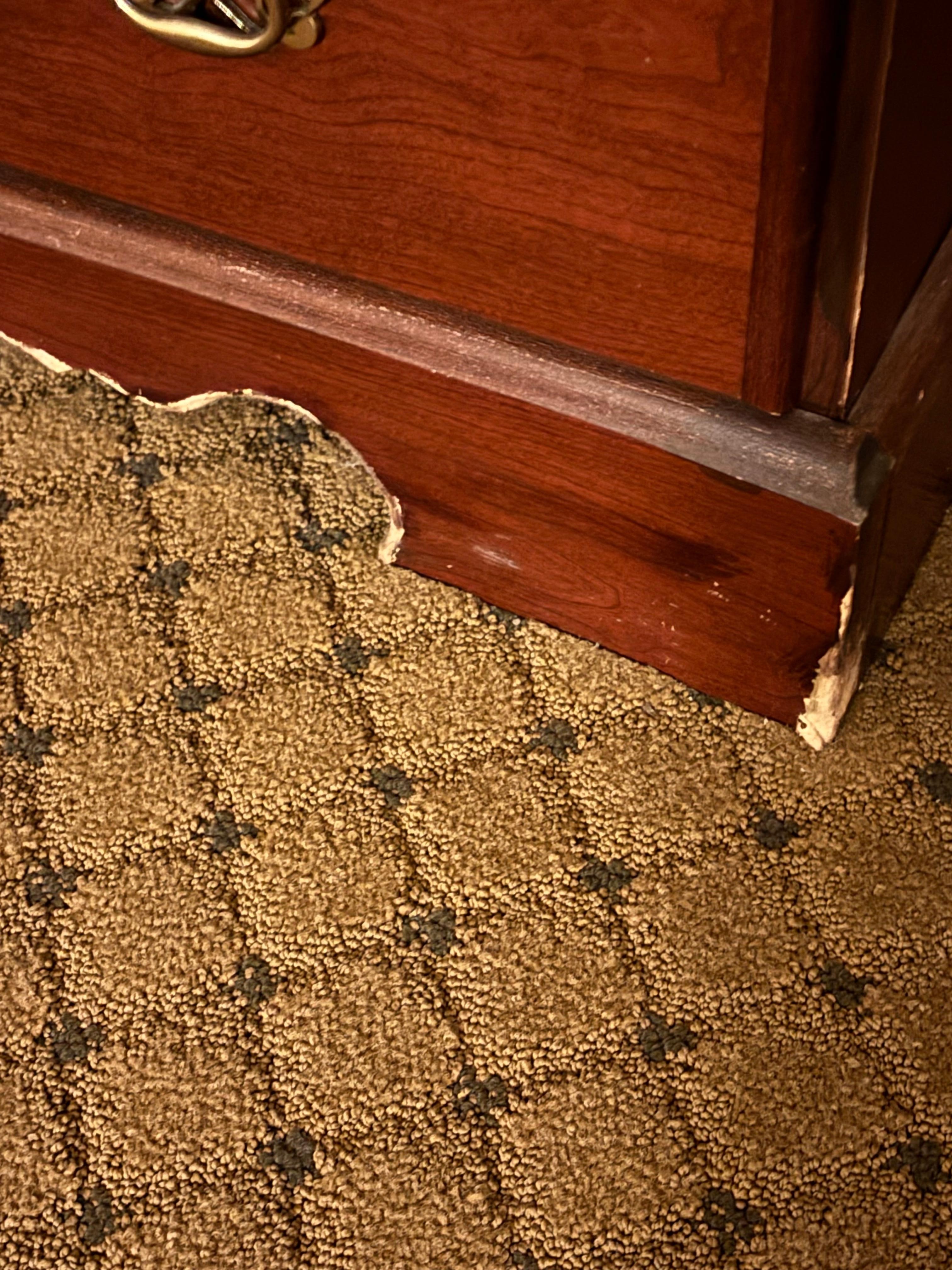 Damaged furniture from vacuum. 