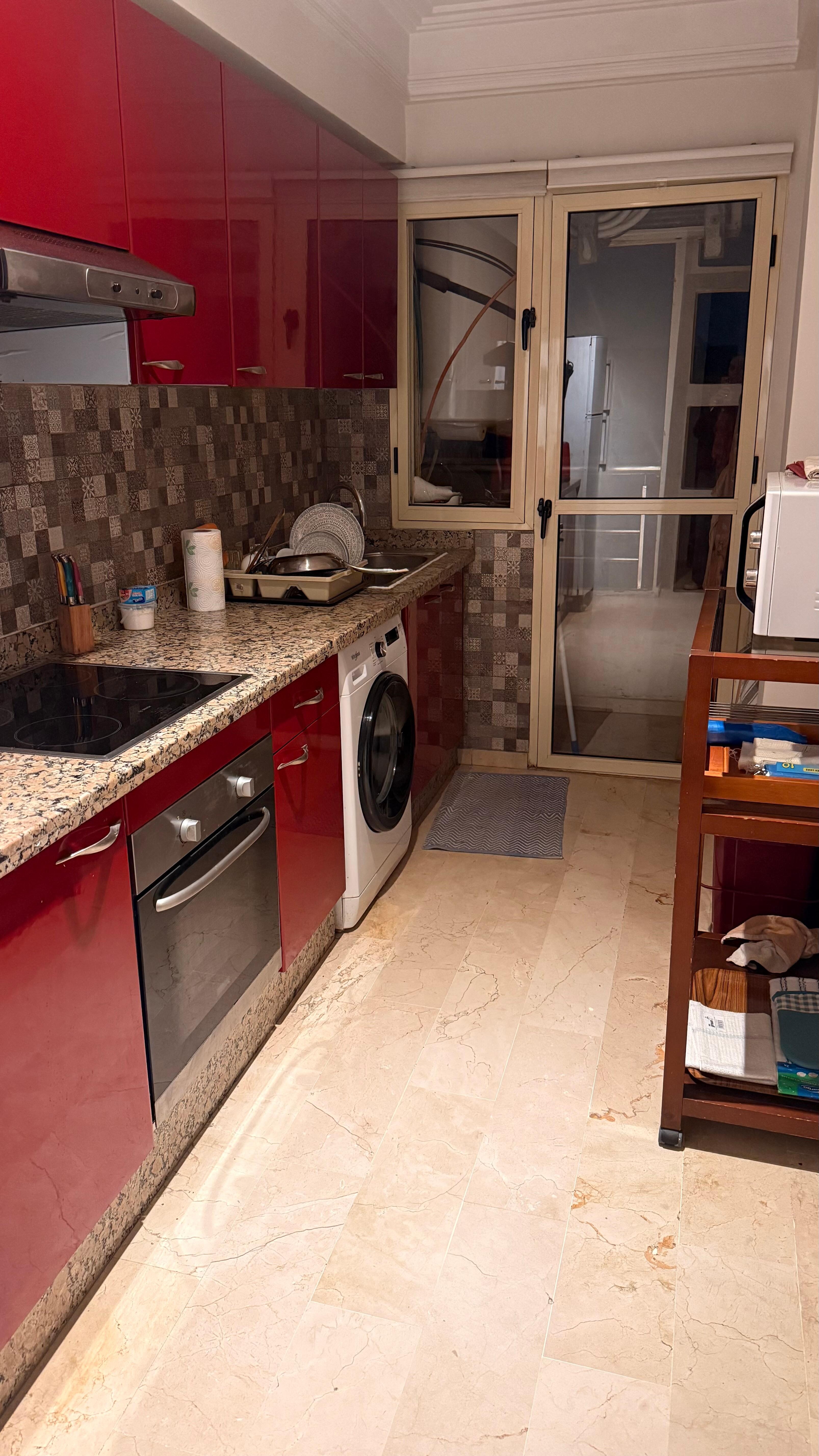 Kitchen is completely separate from the rest of the apartment. LED light flickered for 15 each time it was turned on. Felt like a disco.