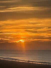 Sunrise and rocking with a cup of coffee.