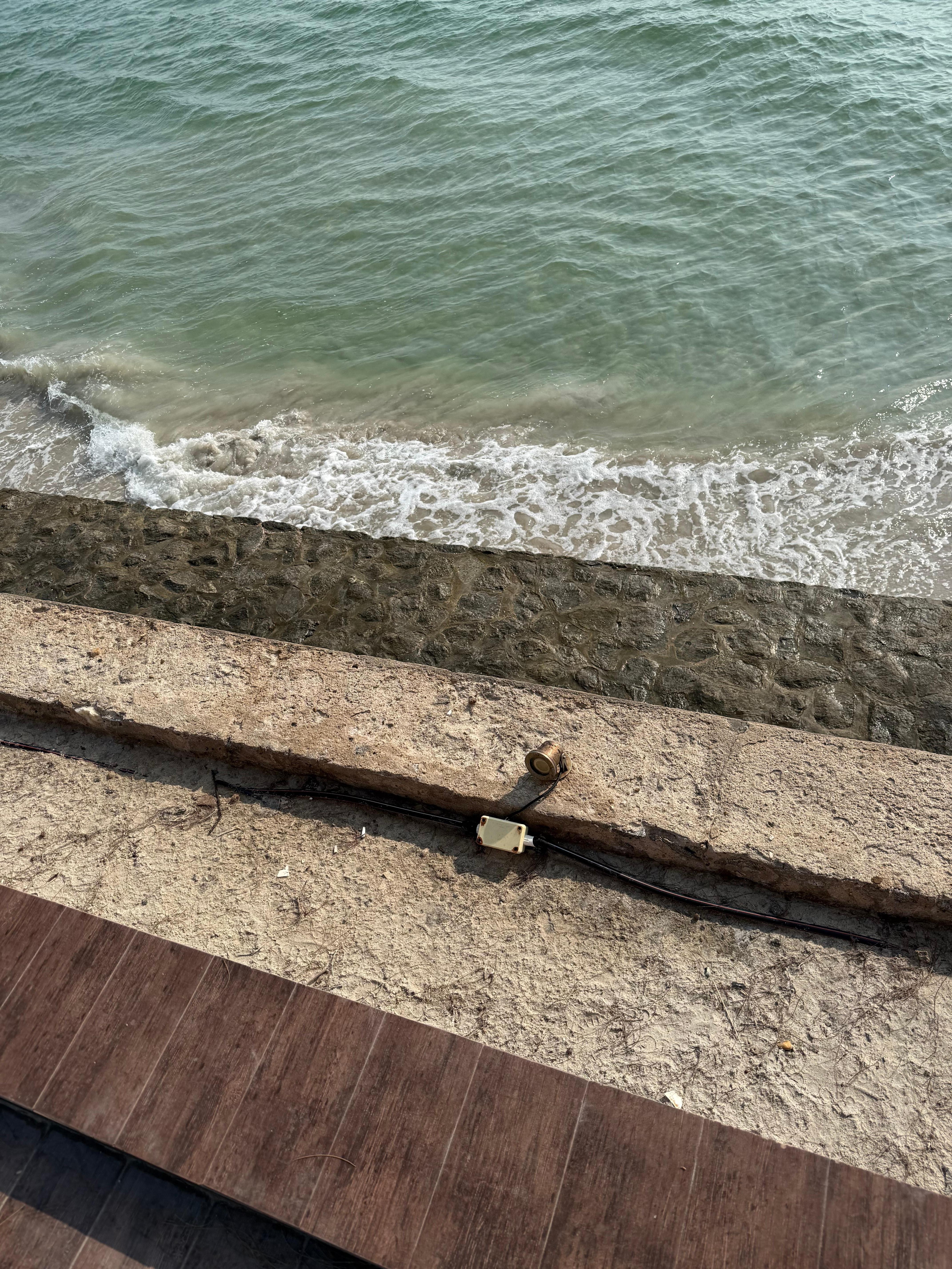 Looking down from property during high tide. 