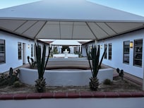 Fire pit area w/ tranquil fountain.