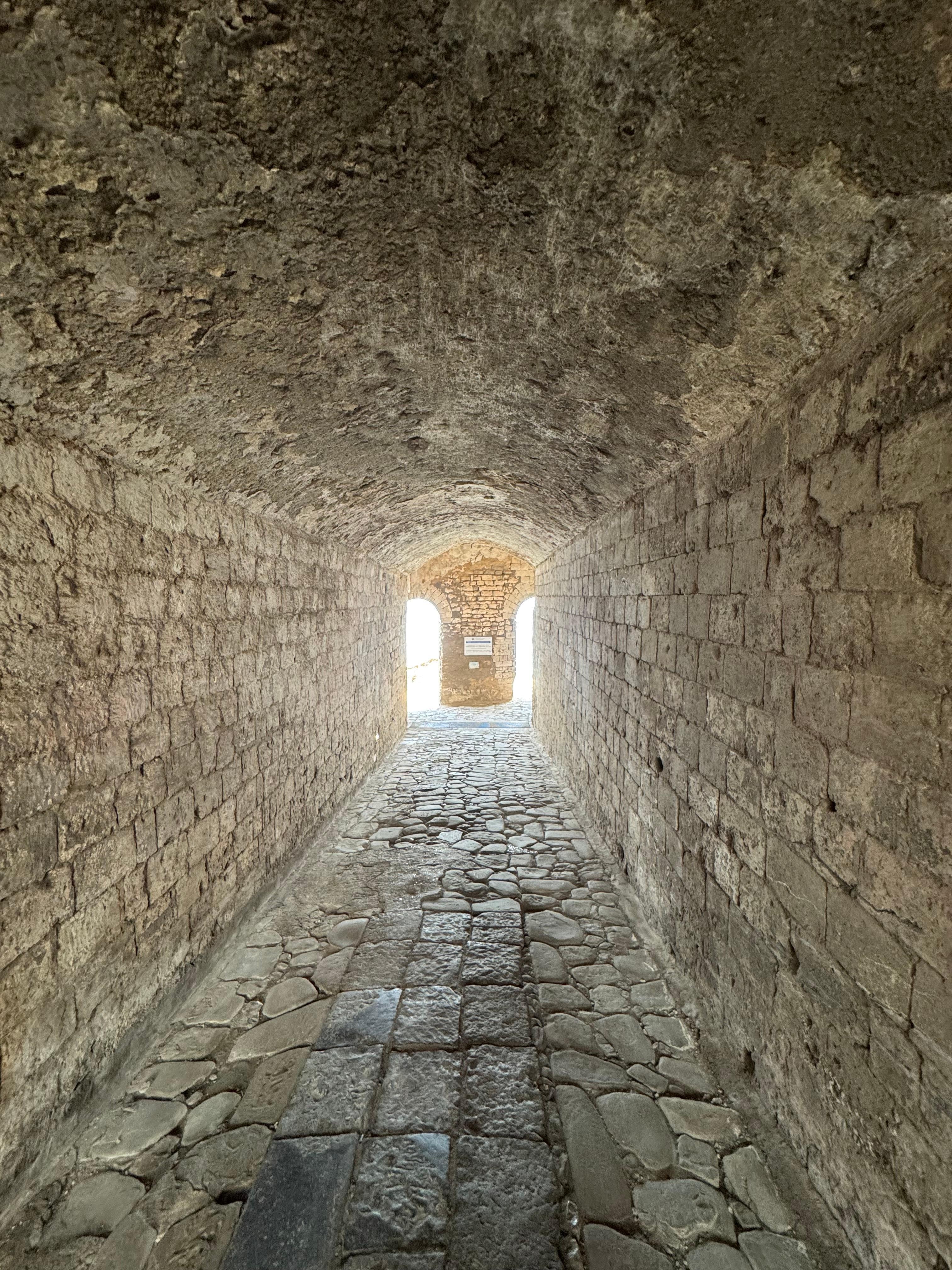 Tunnel to La Marinella beach club. 