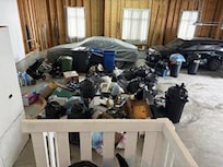 A mountain of garbage in the garage