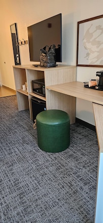 Swivel table, coffee machine, mini fridge and microwave