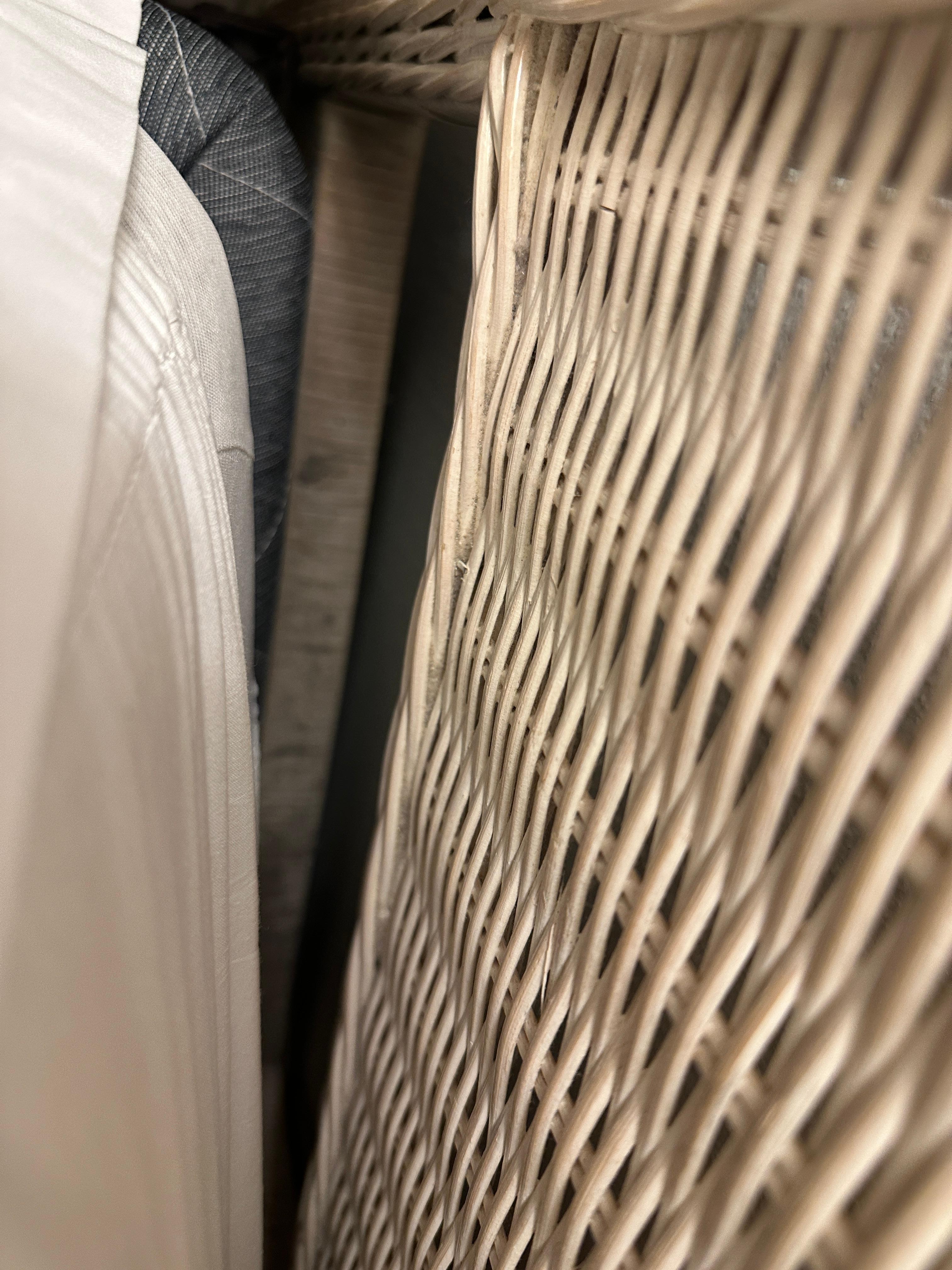 Dirty headboard behind pillow