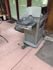 Grills on back patio & random trash items