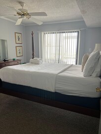 Saggy matters in primary bedroom / no side table on one side / weird light switches