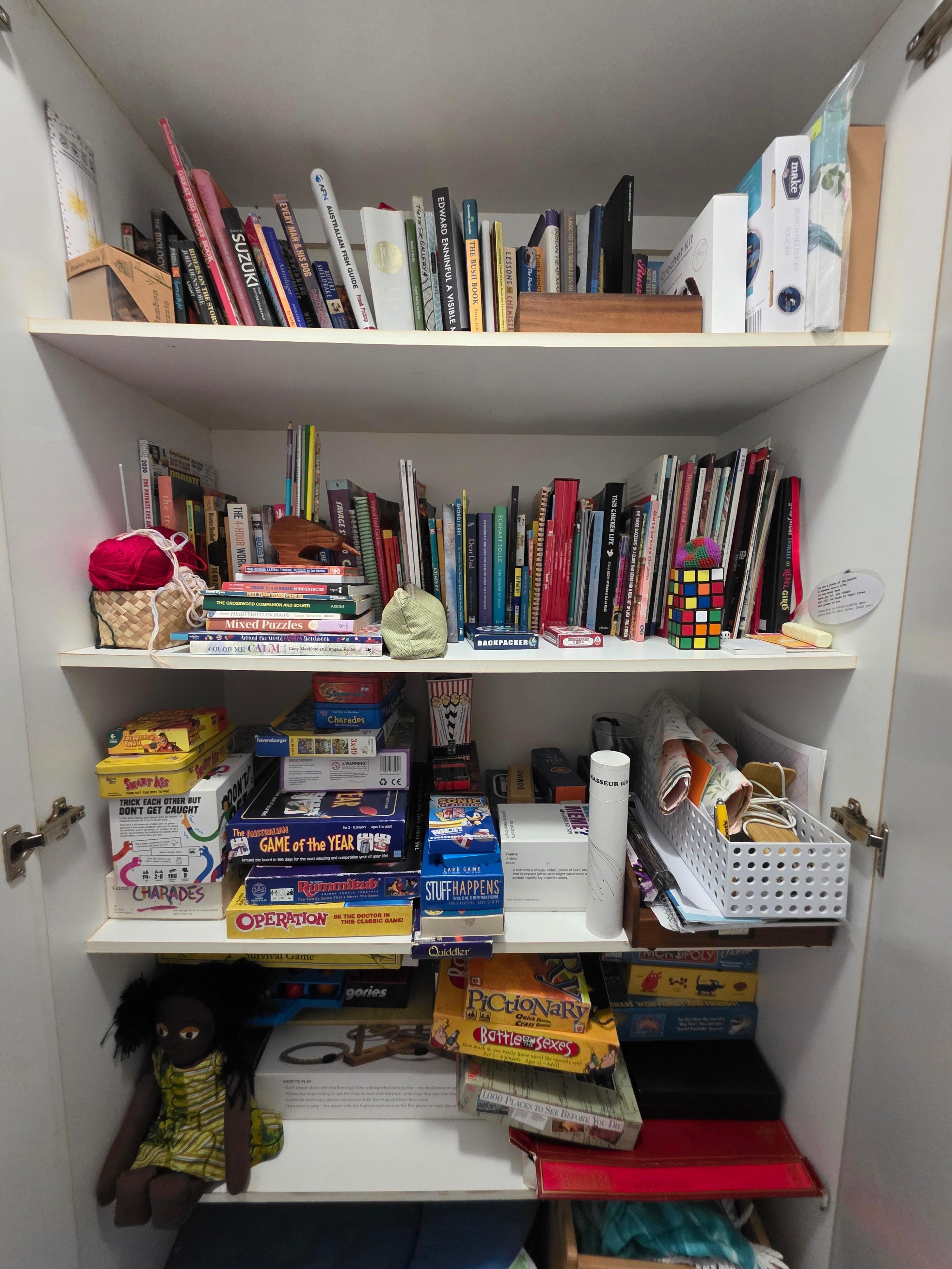 Games,  craft etc! Forgot to take photos of all the floatation devices, kayaks and bikes.  SO much included.