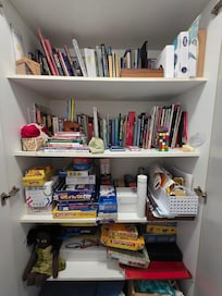 Games, craft etc! Forgot to take photos of all the floatation devices, kayaks and bikes. SO much included.