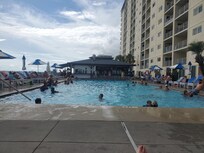 View of pool and The Sandbar. Used to be Bikini Bob's and was very affordable. Now it has $9 hotdogs and $12 drinks.