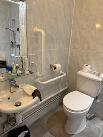 Tap was under glass shelf difficult to use