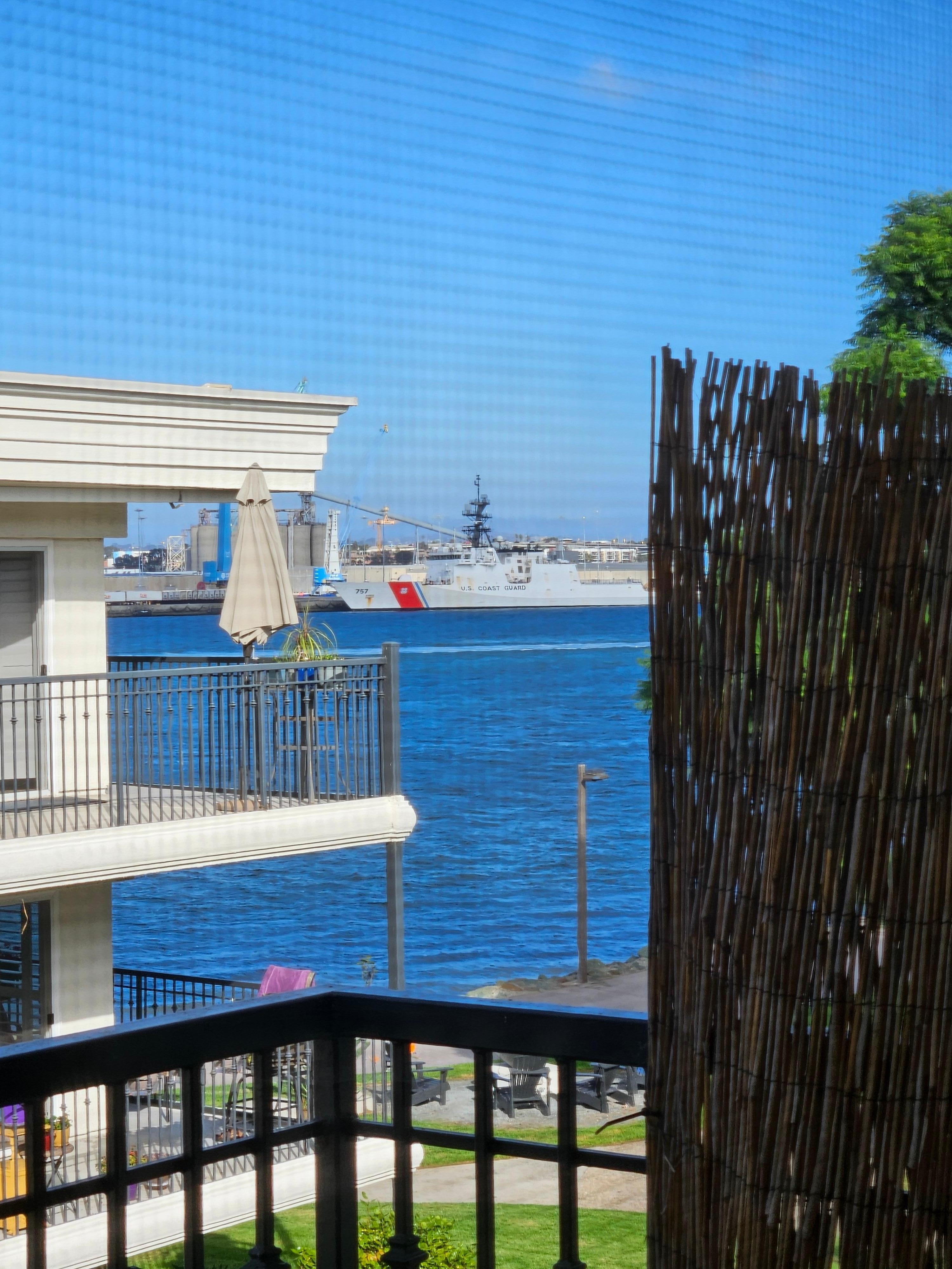 Peek a boo zoom view. Balcony is enclosed with bamboo, so this all you get, if you go outside