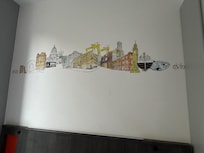No hangings on the wall. But this image appears over the bed. I realized I had seen almost everything in that picture after two days of touring.