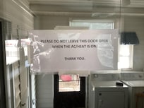 Looking out the coded entry door into the space that leads to the space without heating or air conditioning: (1) carport on the left, (2) patio straight out the back, and (3) second bathroom.