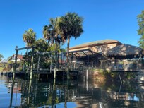 The back of the property from the kayak.