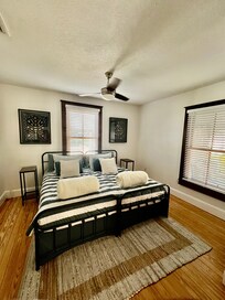 Comfortable room with 2 twins converted to a king bed.