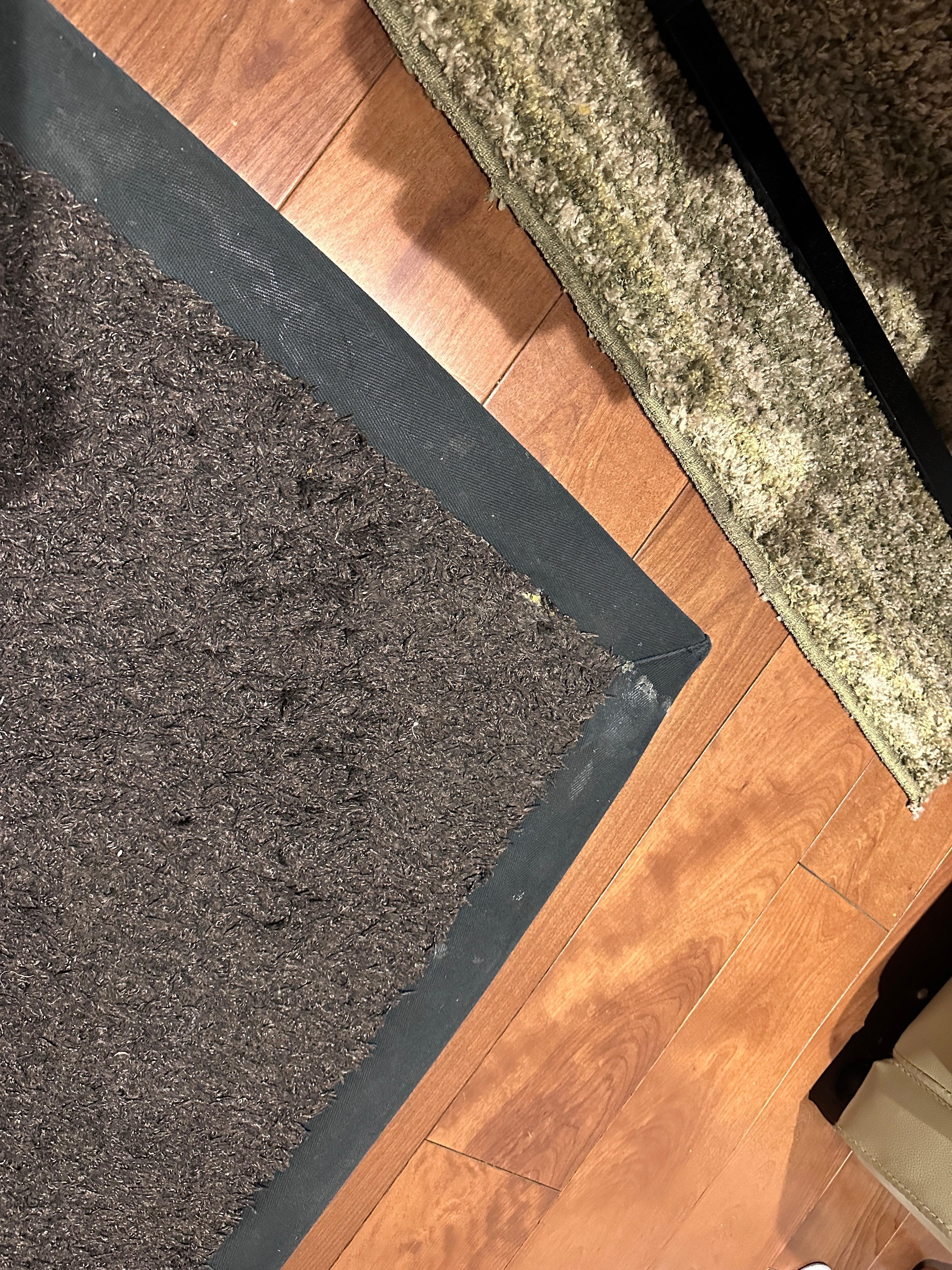 Dirty marked up and worn carpets