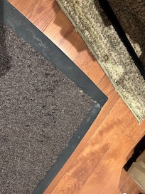 Dirty marked up and worn carpets