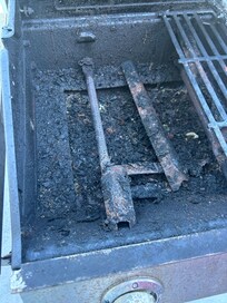 Rusted out flavoring bar broken off.