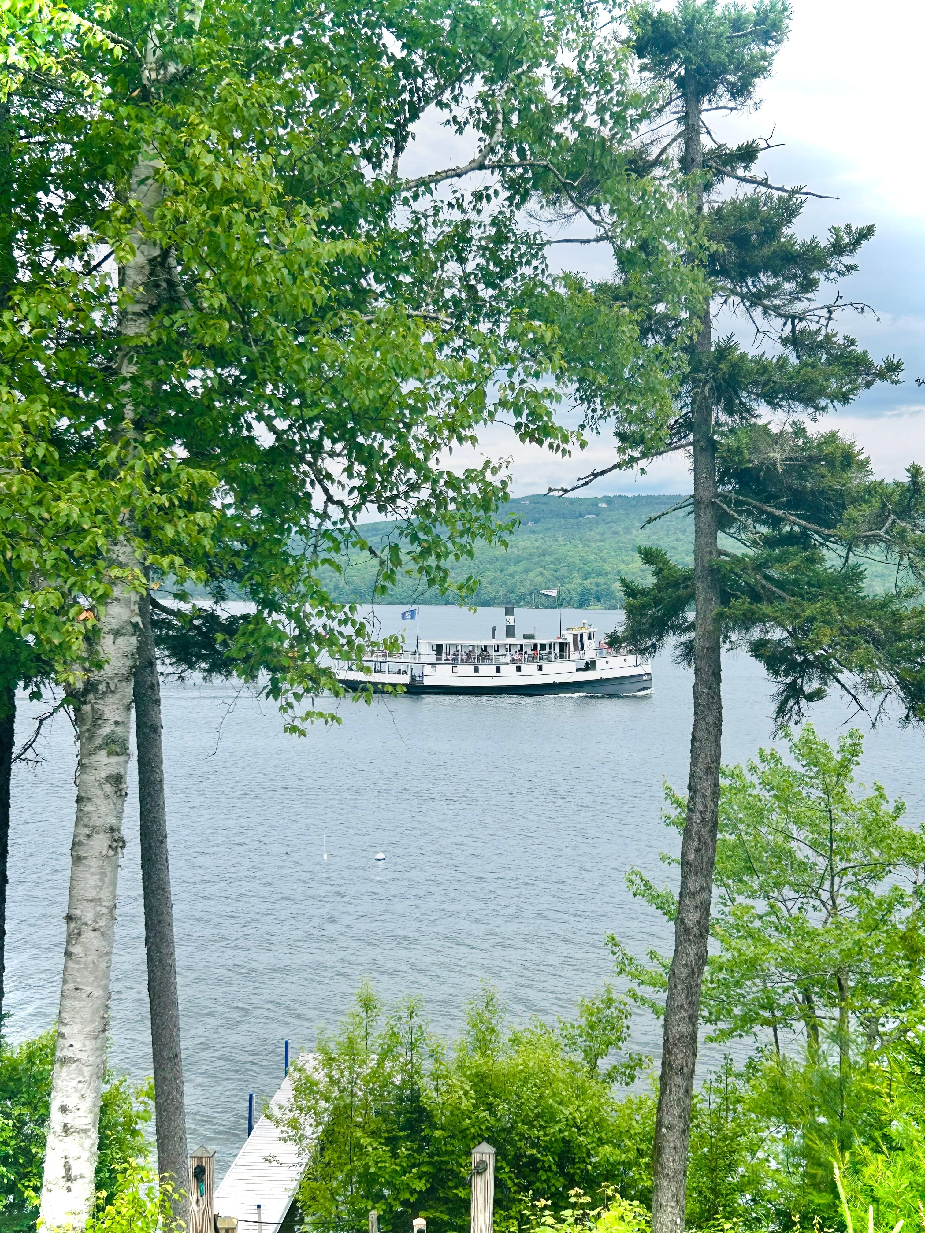 Katahdin Cruise passing by the front of house.