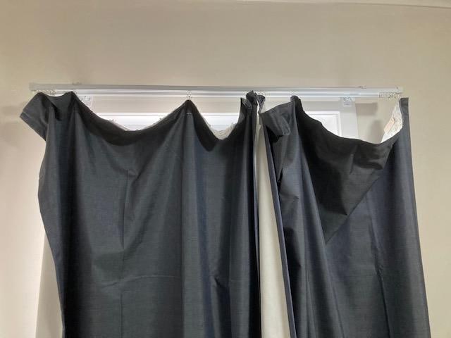 Curtains need rehanging.