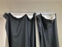 Curtains need rehanging.