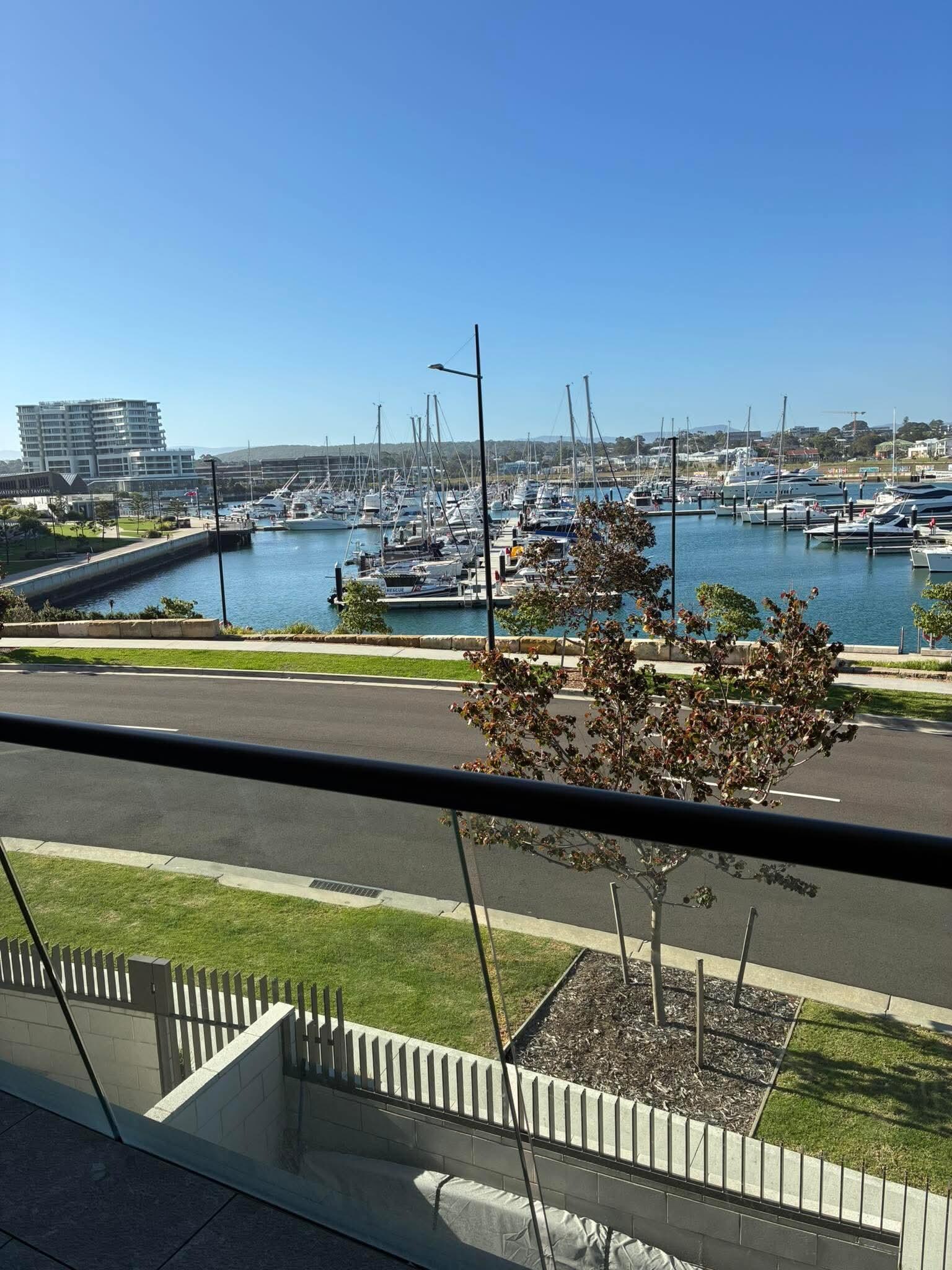 The delightful view across the marina from the living room balcony.