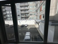 The only window in this place opens only an inch and overlooks parking lot and right into numerous other suites.
