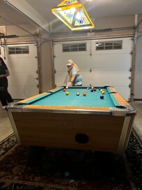 Game room playing pool