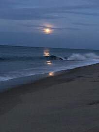 We caught this “moon rise” during a sunset!