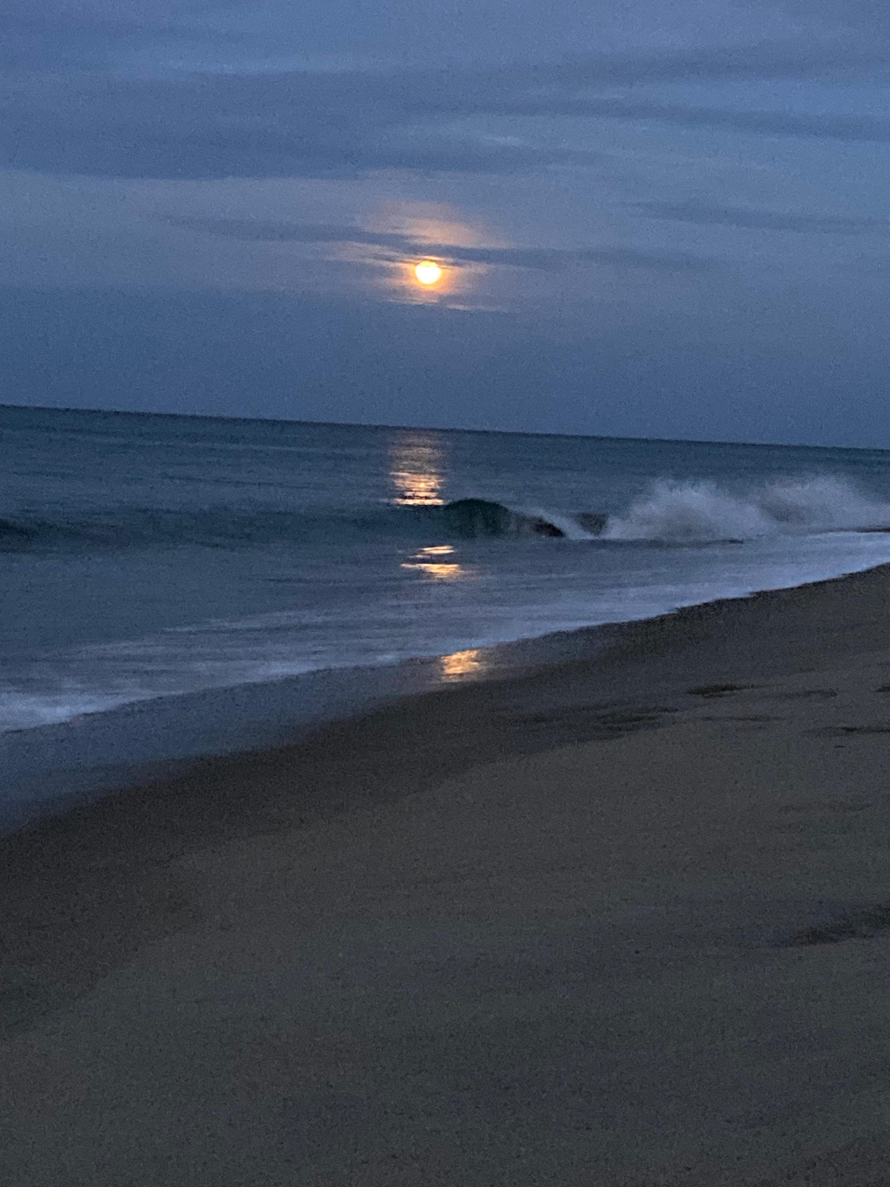 We caught this “moon rise” during a sunset!