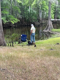 Hubby fishing out back.