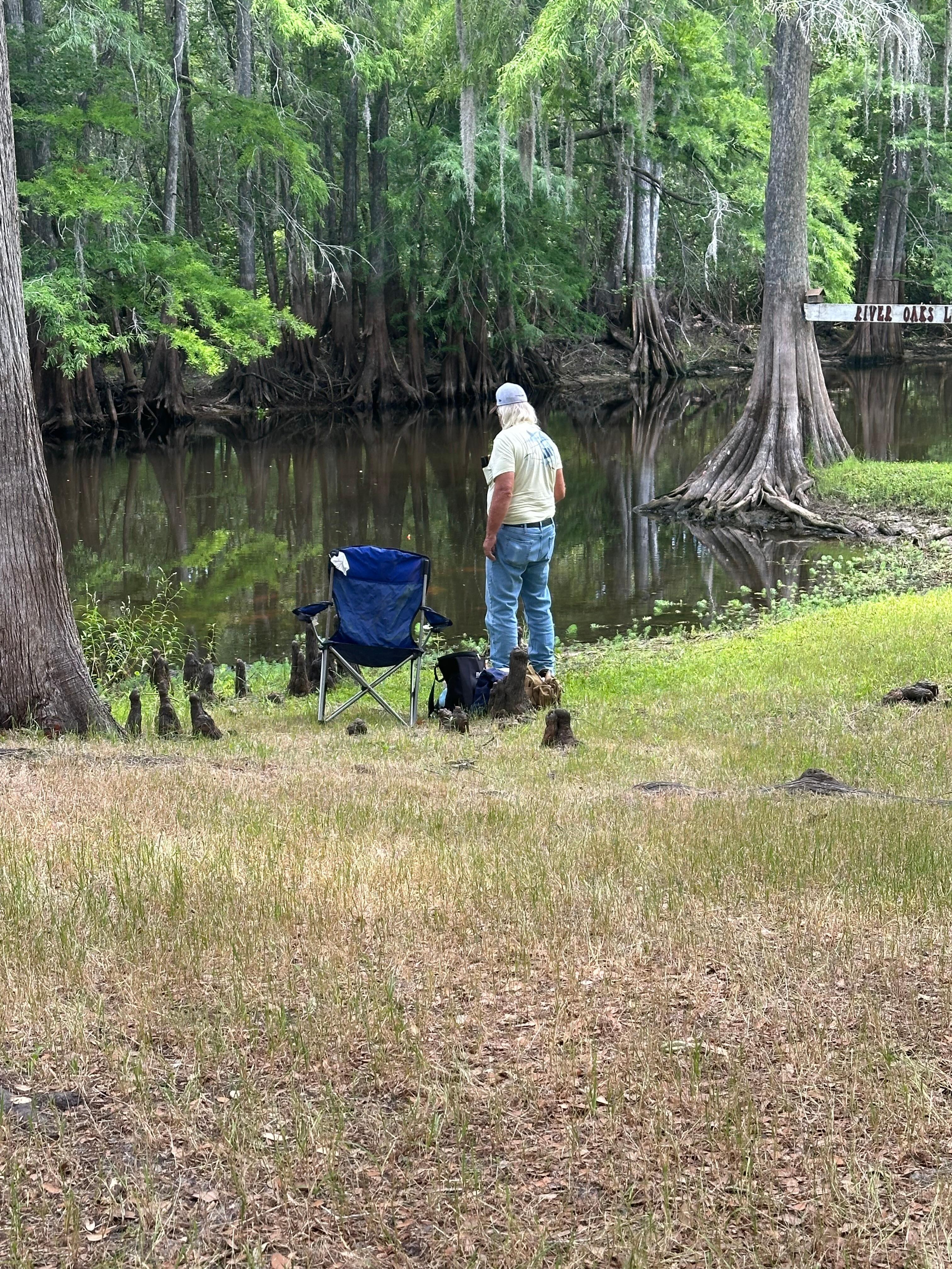 Hubby fishing out back.