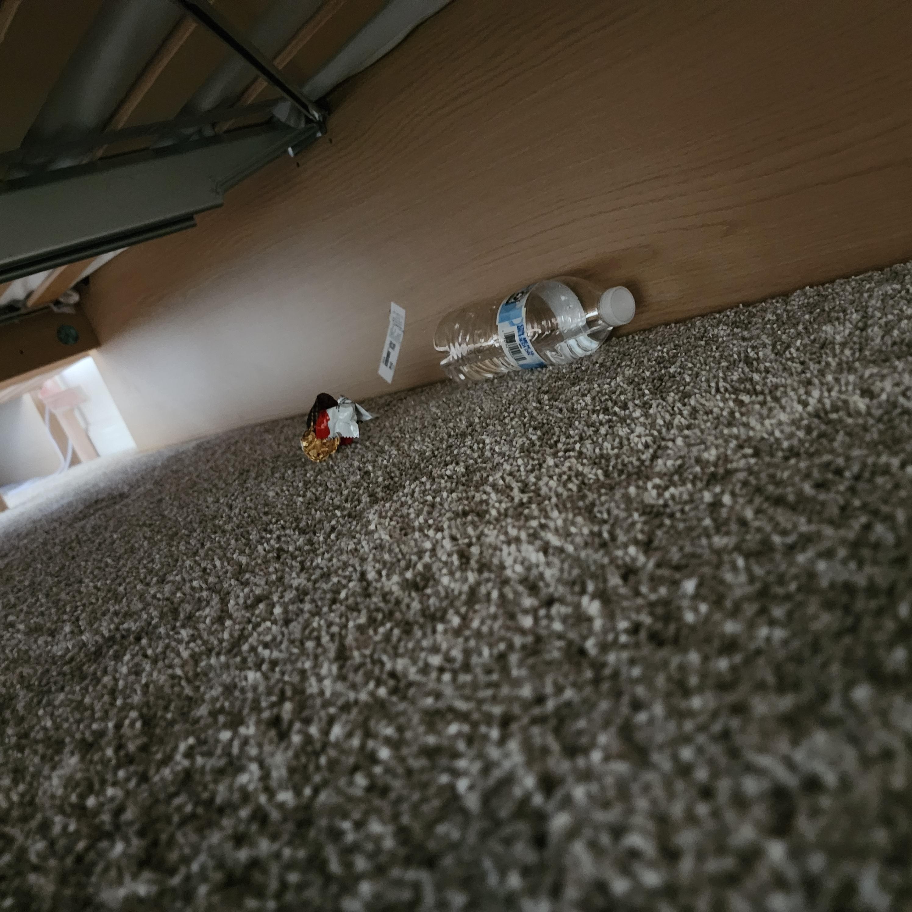 Water bottles& trash under bed