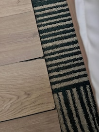 Lifting tiles that can cause injury.