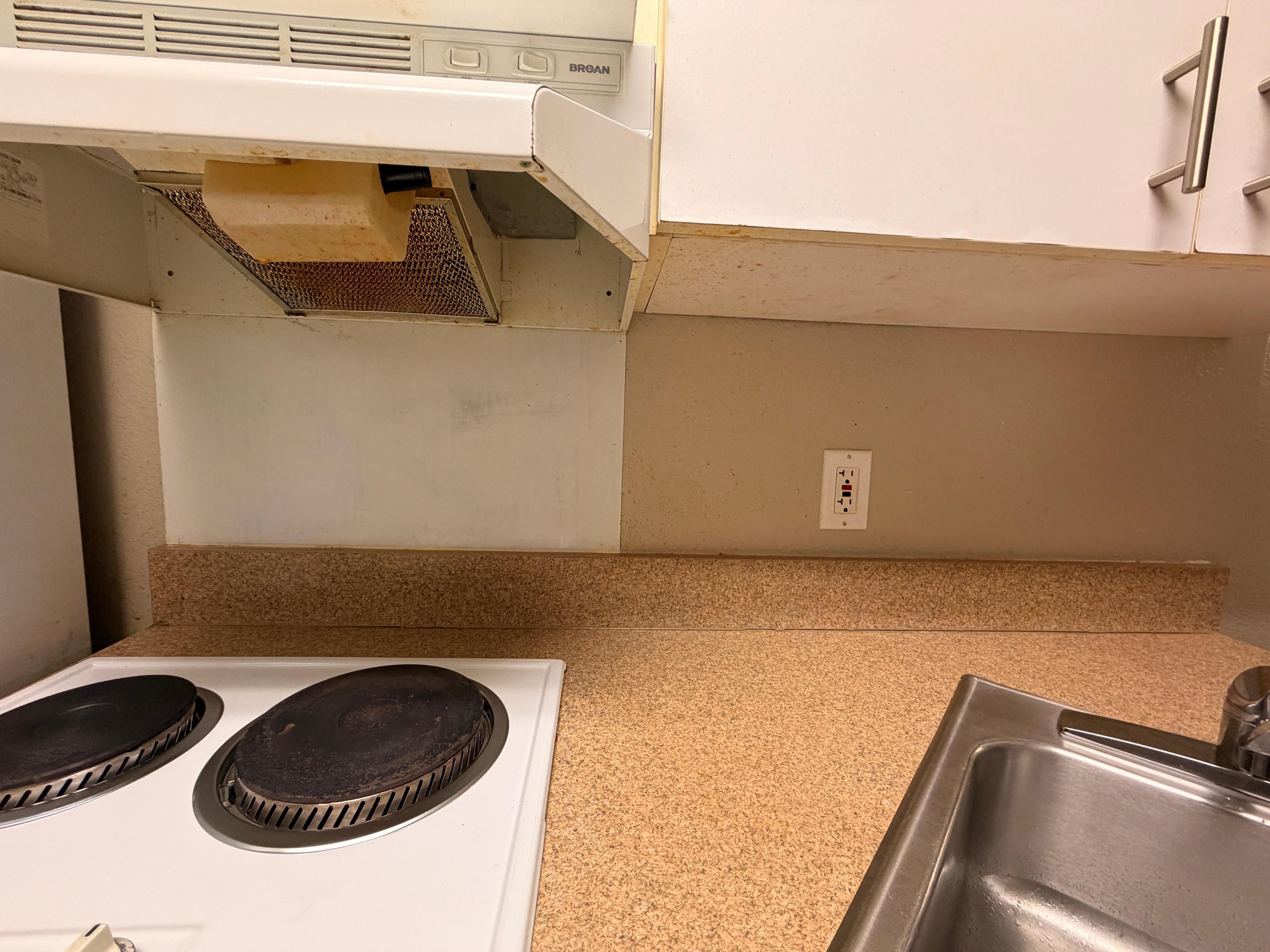 Under the stove and cabinets haven’t been touched in months