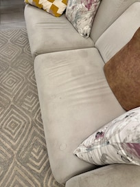 Stained, tired and very uncomfortable sofa