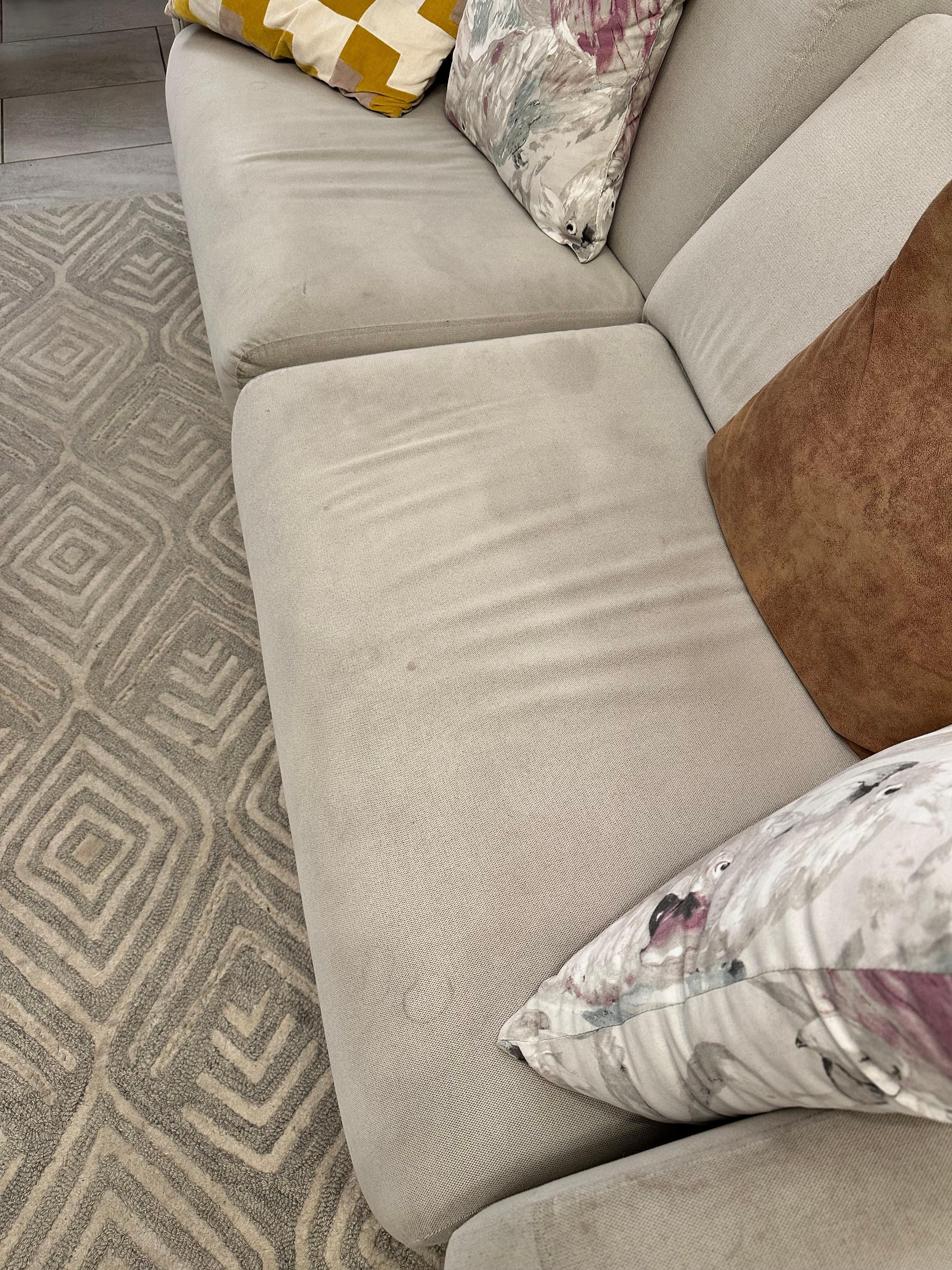 Stained, tired and very uncomfortable sofa