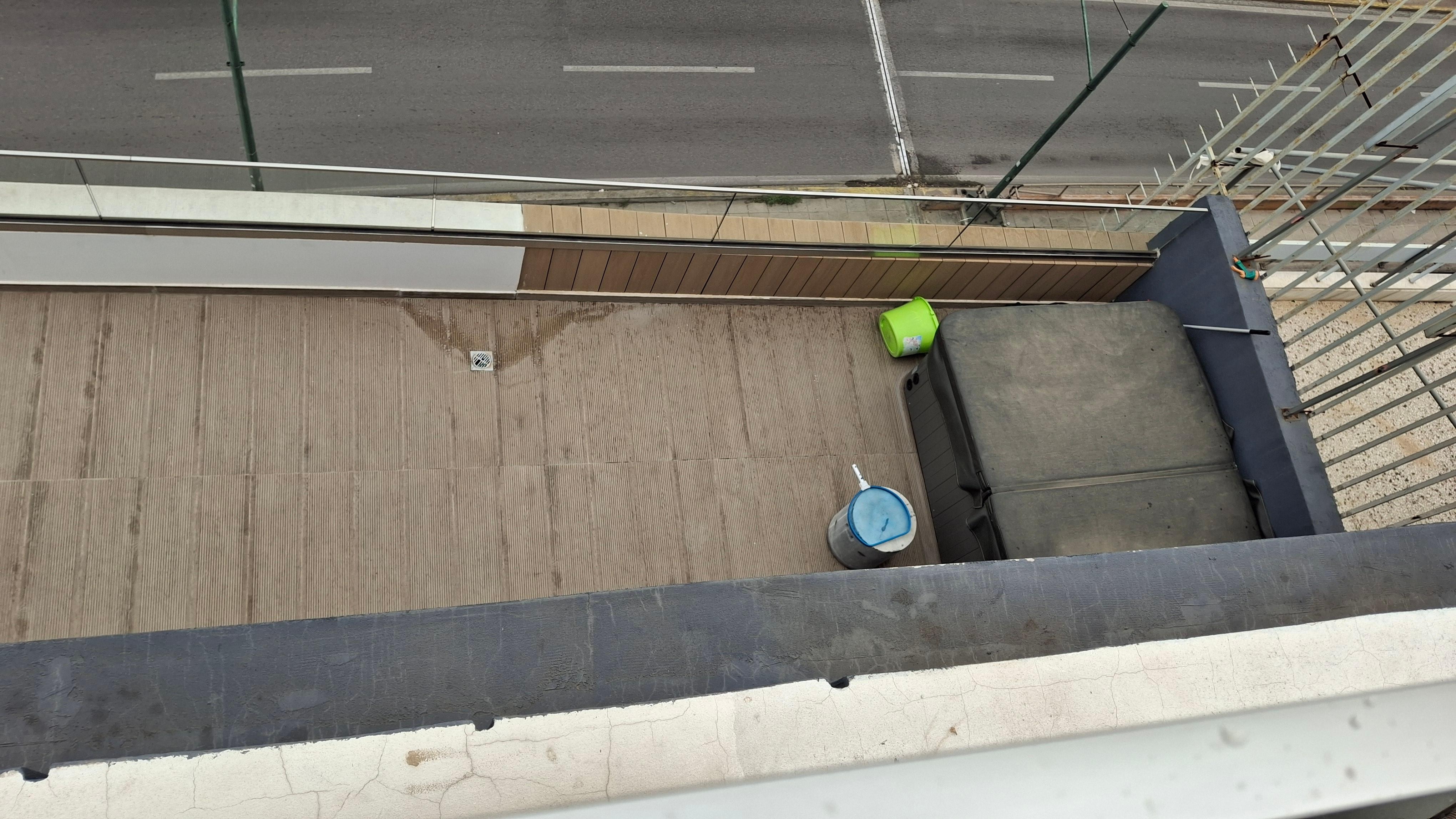 View from public rooftop directly overlooks our balcony and hot tub - no privacy.