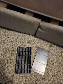Broken cheap material "PLASTIC" that was barely holding up the bed frame.