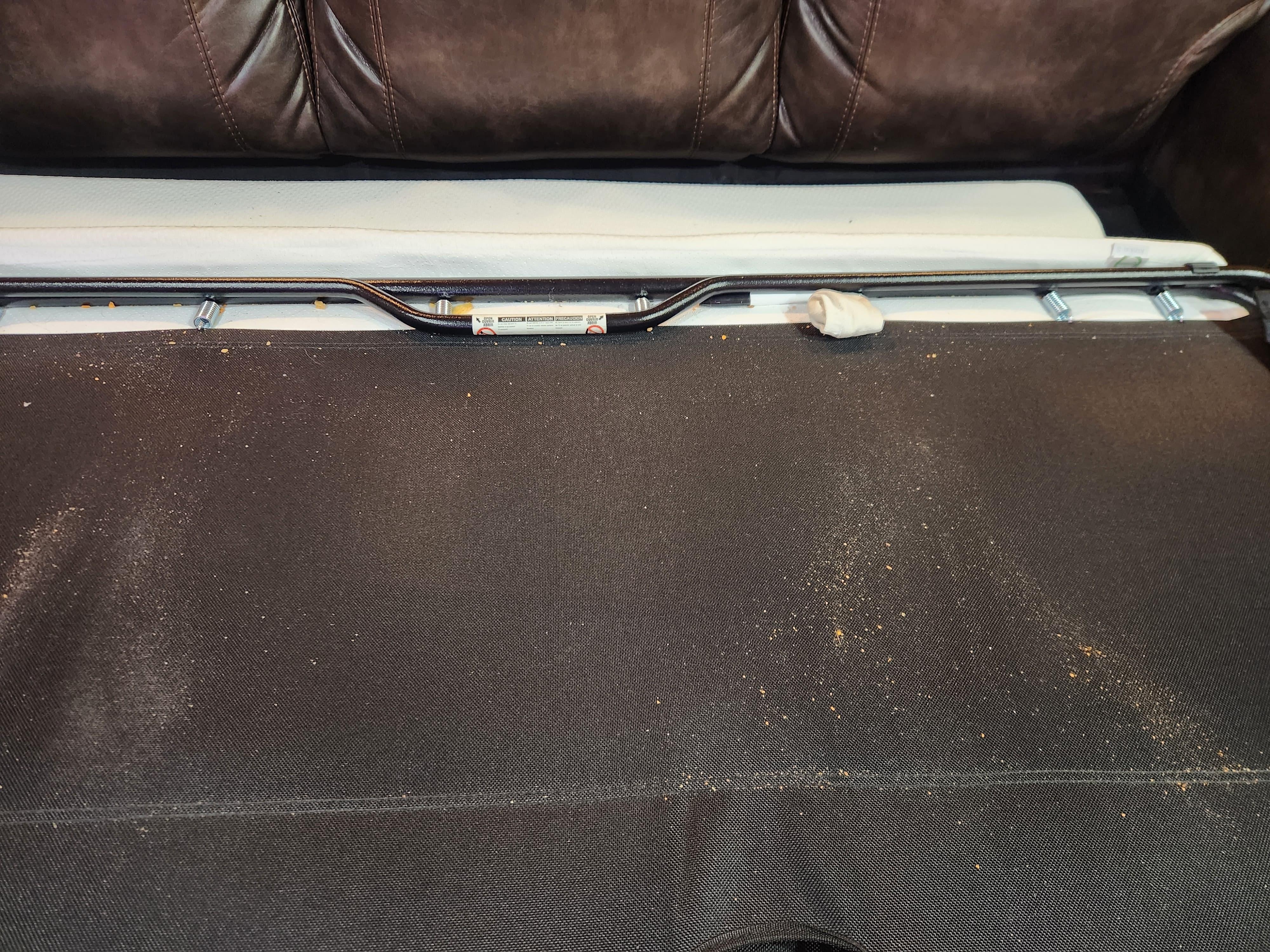 Crumbs and Dirty Clothes in Pull Out Sofa