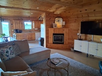 The living room and kitchen area.