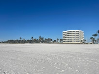 The building from the water's edge, Unit is 2nd one up on farthest left side of building.