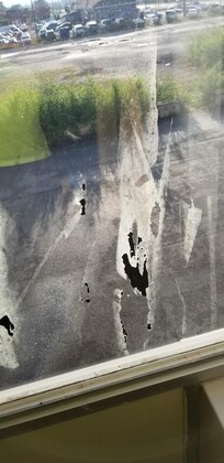 Something stuck on inside of window.