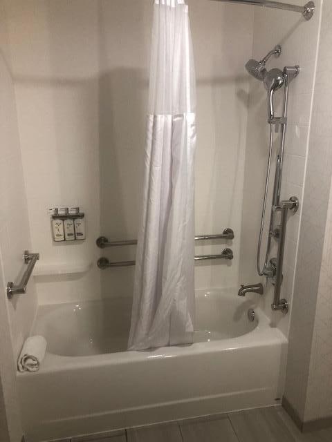 Not walk in, not even shower chair.