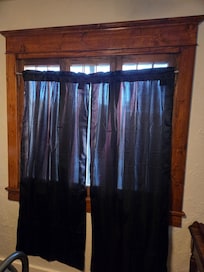 Makeshift curtain. Room had no permanent window coverings coverings.Our room faced parking area.
