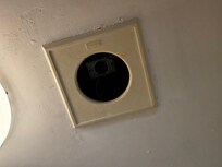 No light or fan system. Just a hole.