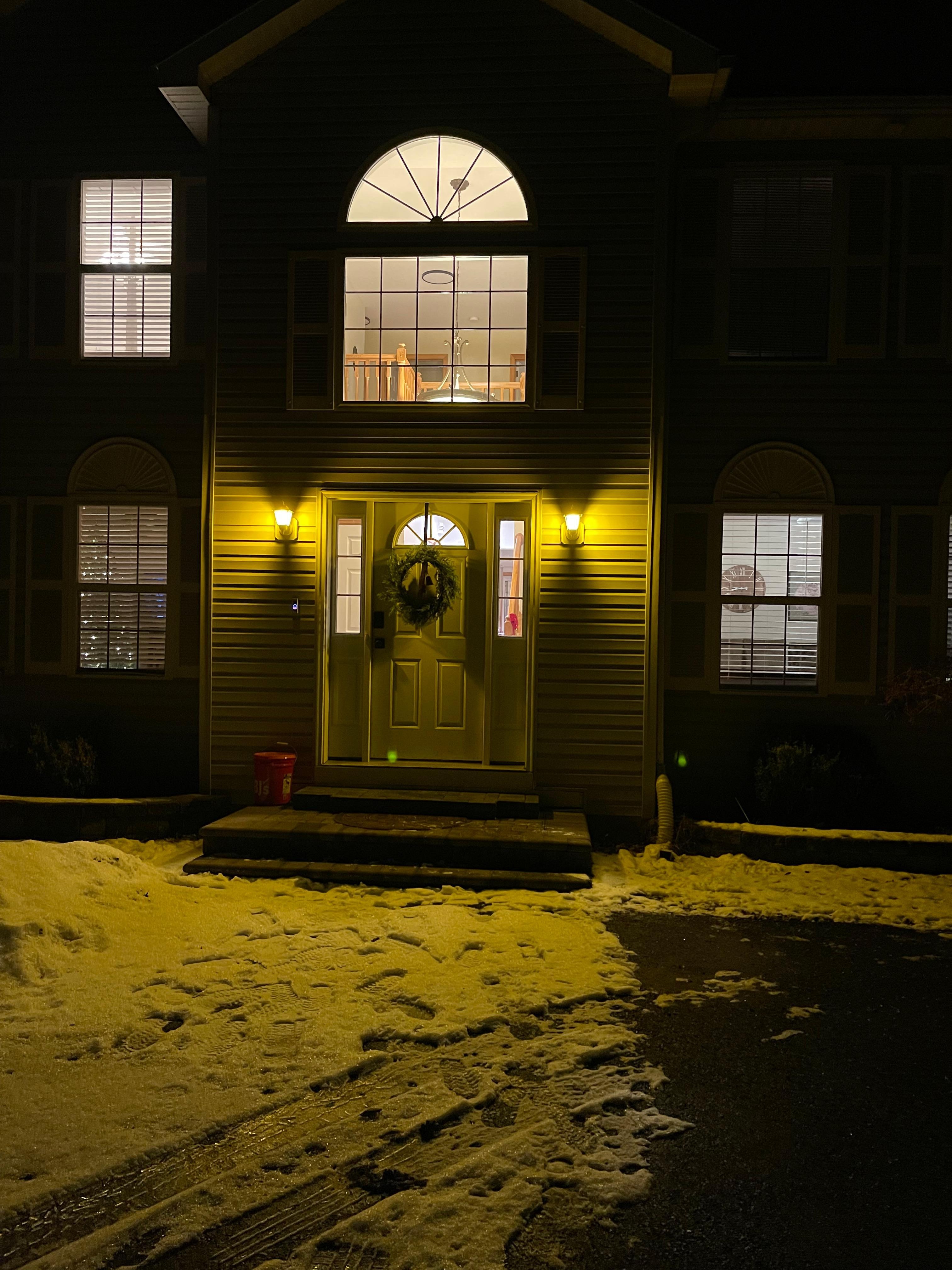The house at night front door . 
