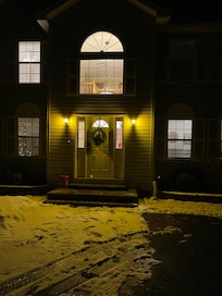 The house at night front door .
