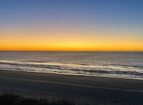 Beautiful sunrise from the porch overlooking the beach.